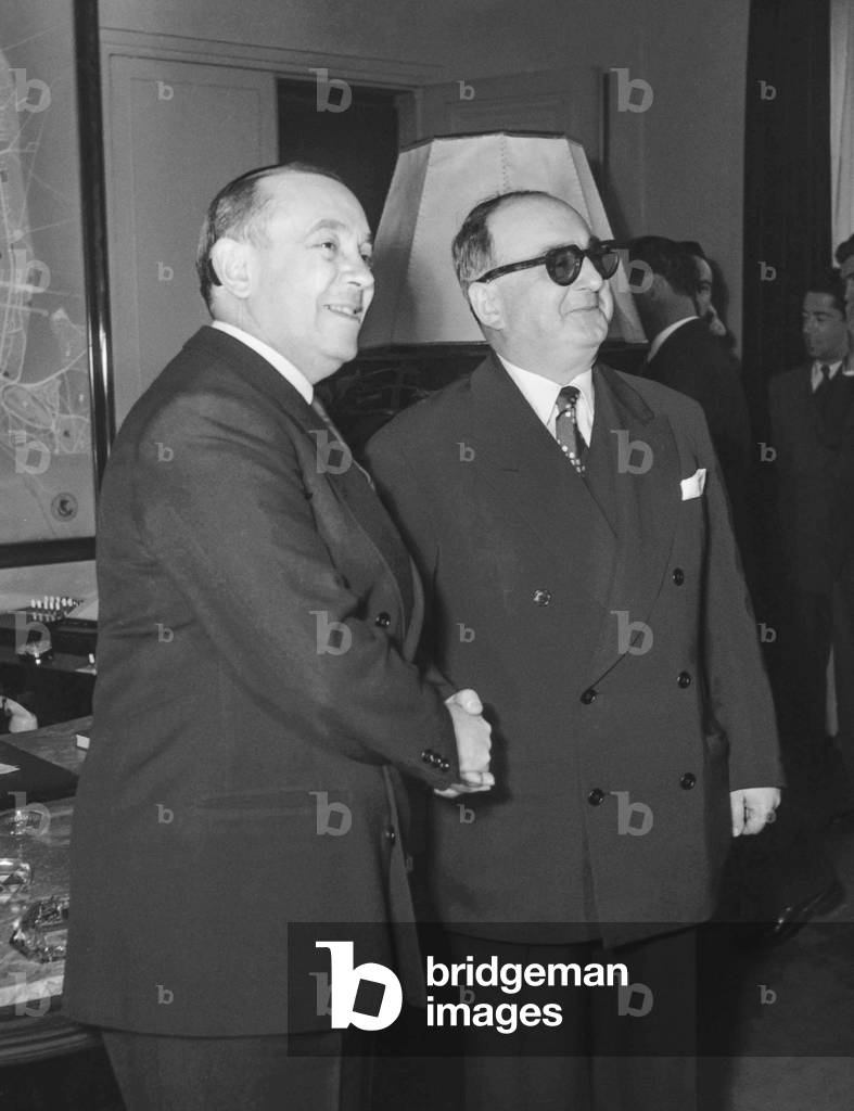 Transfer of power between Roger Leonard, former Paris Police Commissioner and new one, Jean Baylot, May 2, 1951 (b/w photo)