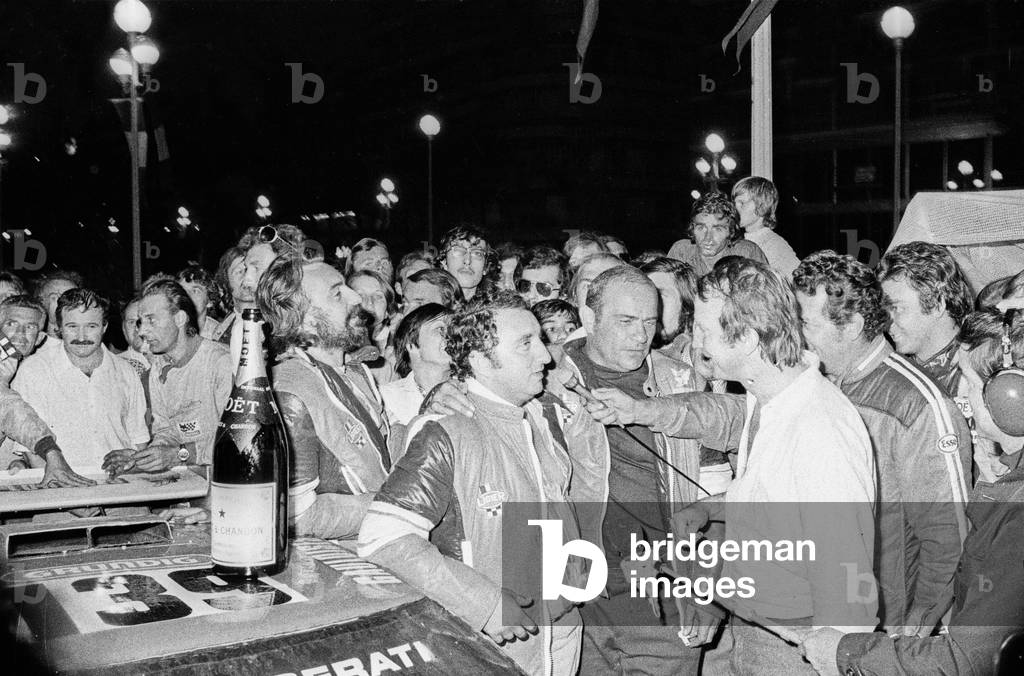 The Winners of the Tour De France Automobile: Jean-Pierre Nicolas And Mr Rives (Ligier Drivers) In The Company Of Guy Ligier (On The Right) During The Arrival In Nice The 23rd Sptembrre 1974 (b/w photo)