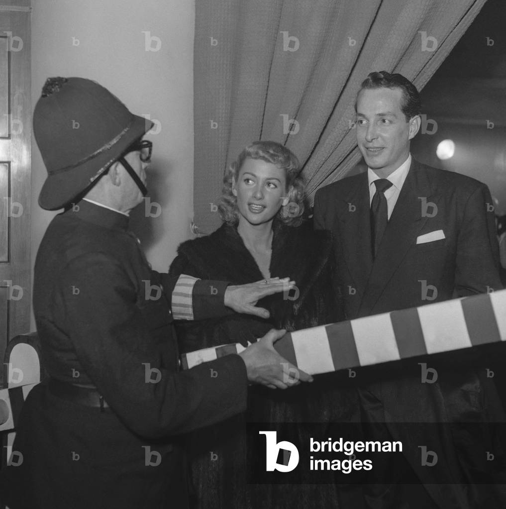 Martine Carol and her husband Steve Crane on December 6, 1949, Paris (b/w photo)