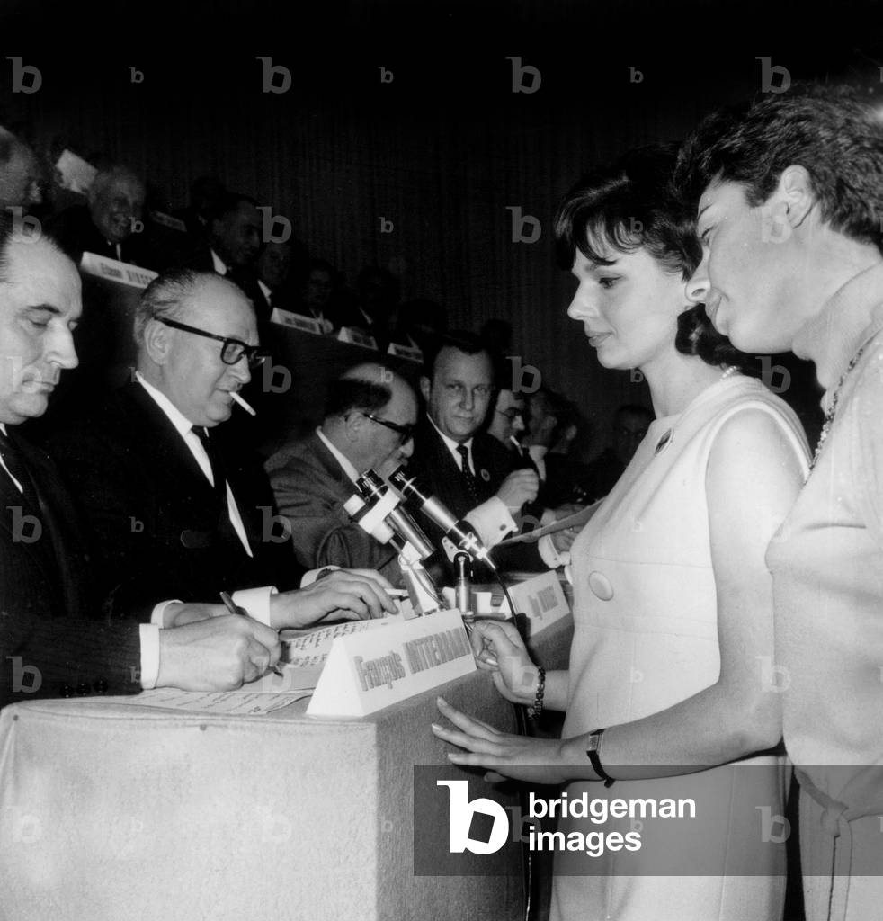 Facing Francois Mitterrand, Guy Mollet, Rene Billeres and Charles Hernu, Are Two Women Candidates To The Socialist General Elections : (L) Annie Duperrey and (R) Caroline Villard January 29, 1967 in Paris (b/w photo)