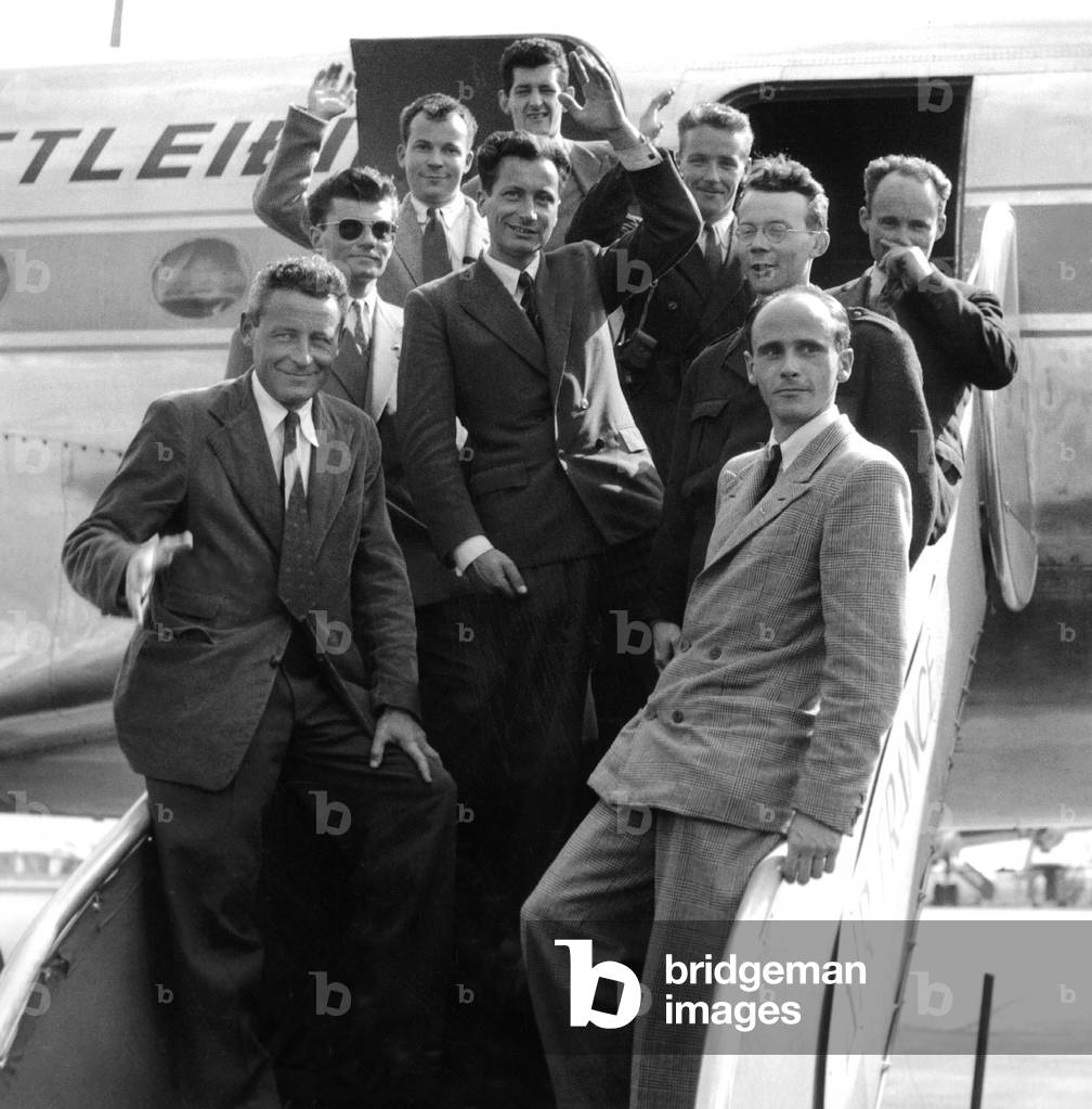 French Explorer Paul-Emile Victor With his Crew at Paris Airport Back From Greenland Expedition August 10, 1950 (b/w photo)