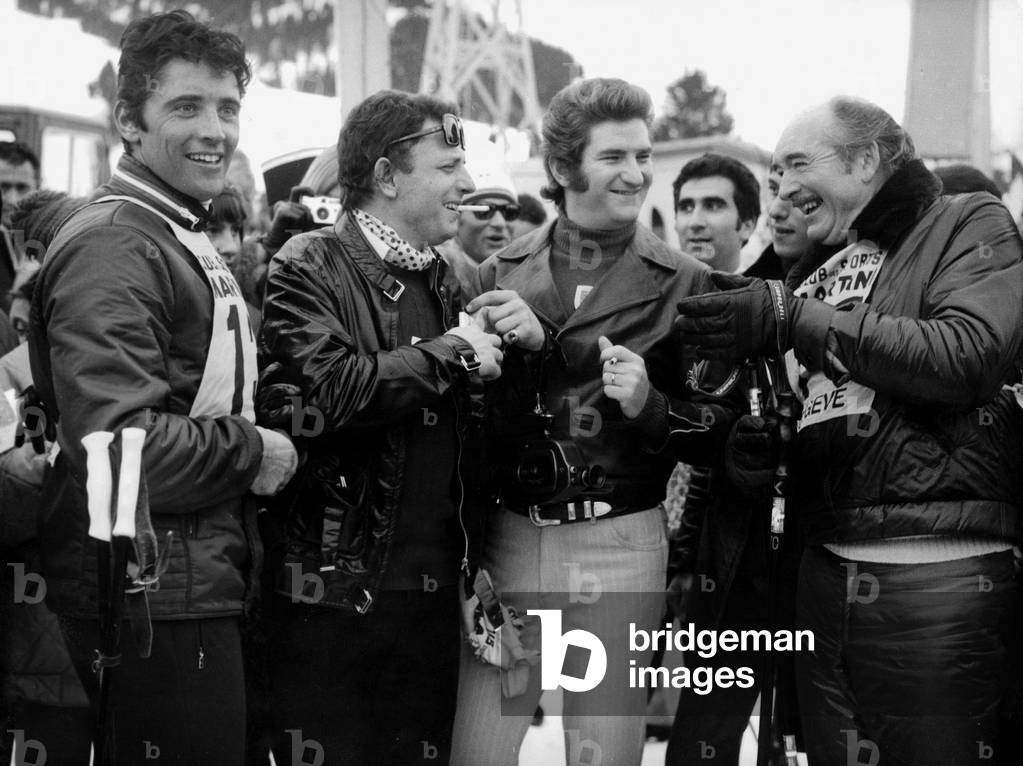 L-R Singer Sacha Distel Winner of Skiing Event during International Artists Prize in Megeve With Actor Jacques Martin Singer Eddy Mitchell and Producer Eddie Barclay January 13, 1969 (b/w photo)