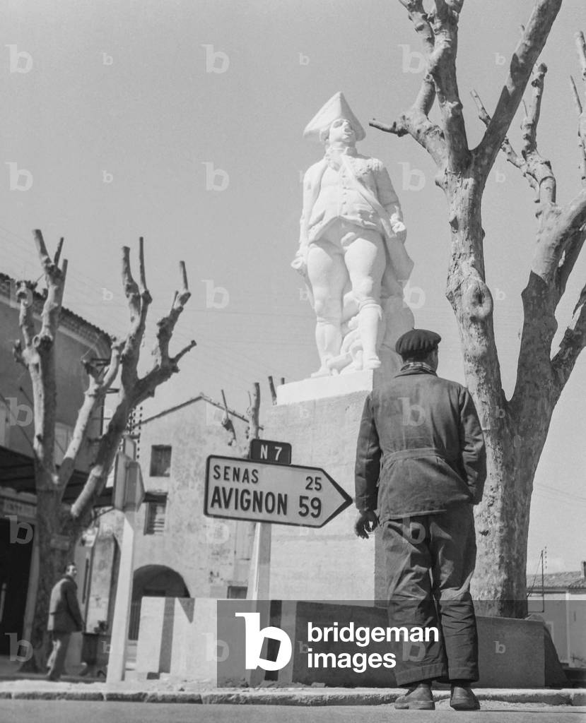 The statue of the Pierre Andre de Suffren (French Admiral) in Saint Cannat, south of France, August 1951 (b/w photo)