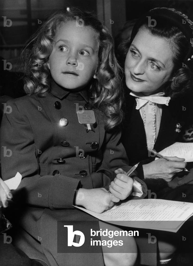Young Actress Brigitte Fossey Attending A Children Fashion Show, Paris, February 26, 1953 (b/w photo)
