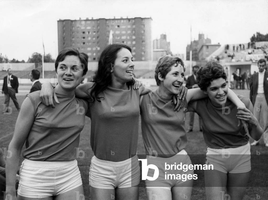 L-R : Eliane Jacq, Colette Besson (1946-2005), Nicole Duclos and Michele Mombet After They Beat The World Record For The 4 By 400 Metres Relay, July 7, 1969 (b/w photo)
