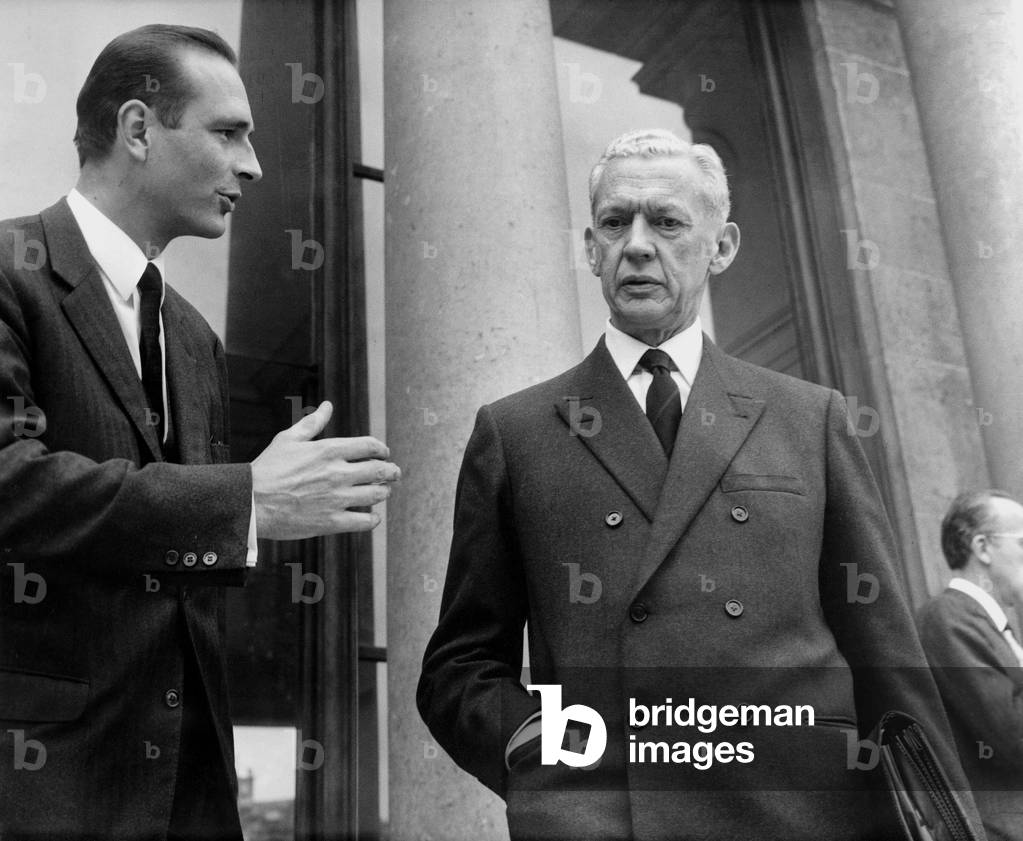 French Prime Minister Maurice Couve De Murville (R) and Jacques Chirac Estate Secretary of Economy and Finances Leaving Elysee Palace After Ministers Counsil September 25, 1968 (b/w photo)