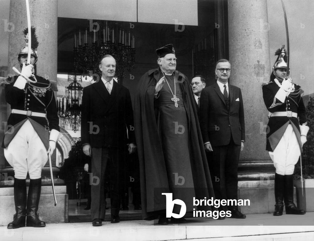After His Interview With General De Gaulle L'Archeveque De Canterbury Michael Ramsey Leaving The Palace Of L'Elysee With His Cotes (Left) Sir Patrick Reilly Ambassador Of Great Britain 22 April 1967 (b/w photo)