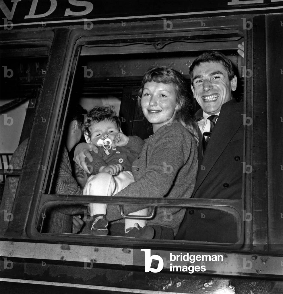 Marina Vlady and Robert Hossein With Son Pierre Going in Czechoslovakia Filming Liberte Surveillee June 14, 1957 (b/w photo)