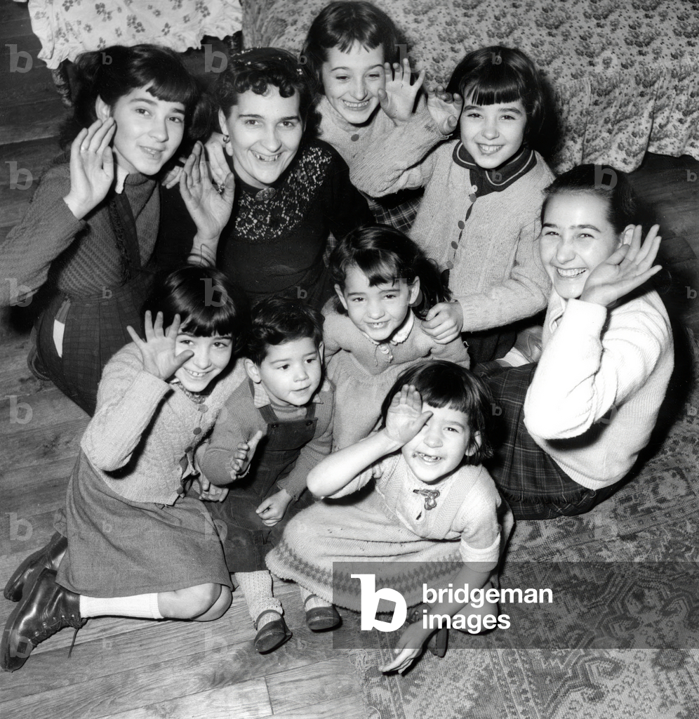 Mrs Chabrol and her 8 Children Has Received The Prize Cognacq-Jay (For Poor Family With More Than Two Children) December 1952 (b/w photo)