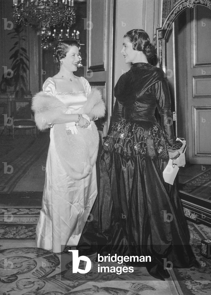 Danish sovereigns in Paris, November 28, 1950 : Mme Servan Schreiber (Suzanne Cremieux) and her daughter during a reception at the Elysee (b/w photo)