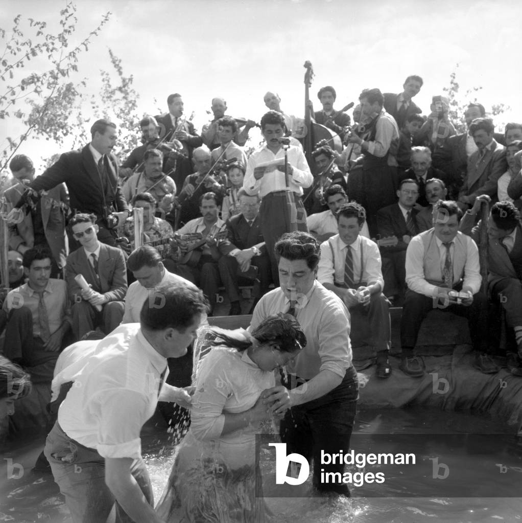 Christening of Evangelist Gypsies (Adults) By Immersion in Armainvillier, France, May 30, 1957 (b/w photo)