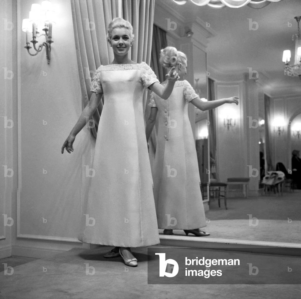French Actress Marie Dubois With A Dress By Jacques Launay For A Charity Ball, Paris, December 13, 1965 (b/w photo)