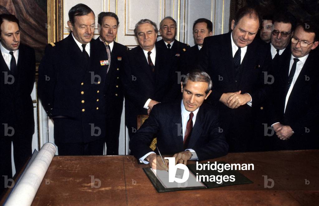 French Minister of Defence Paul Quiles Signing Agreement For The Building of Nuclear Aircraft Carrier 