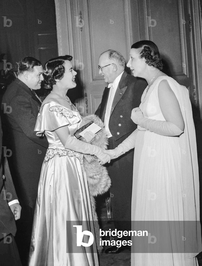 Reception of the members of Parliament at the Elysee, Paris, February 1st, 1950 : French politician Paul Coste-Floret and his wife with French president Vincent Auriol and his wife Michelle (b/w photo)