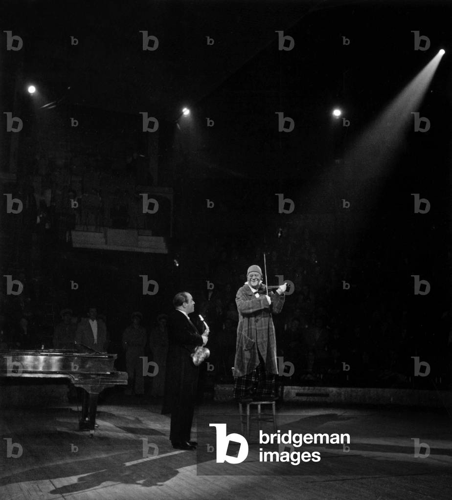 The Clown Grock In Representation With His Violin On 12/01/1952 (b/w photo)