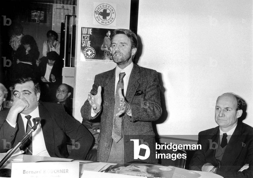 Bernard Kouchner (C) With French Minister of Social Affairs Philippe Seguin and Adrien Zeller at Opening of New Unit For The World Doctors Humanitarian Association in Paris November 13, 1987 Aide Humanitaire (b/w photo)