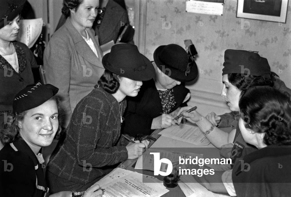 Women Signing Their Volunteering Act during Hostilities, Paris, France, 1939 (b/w photo)