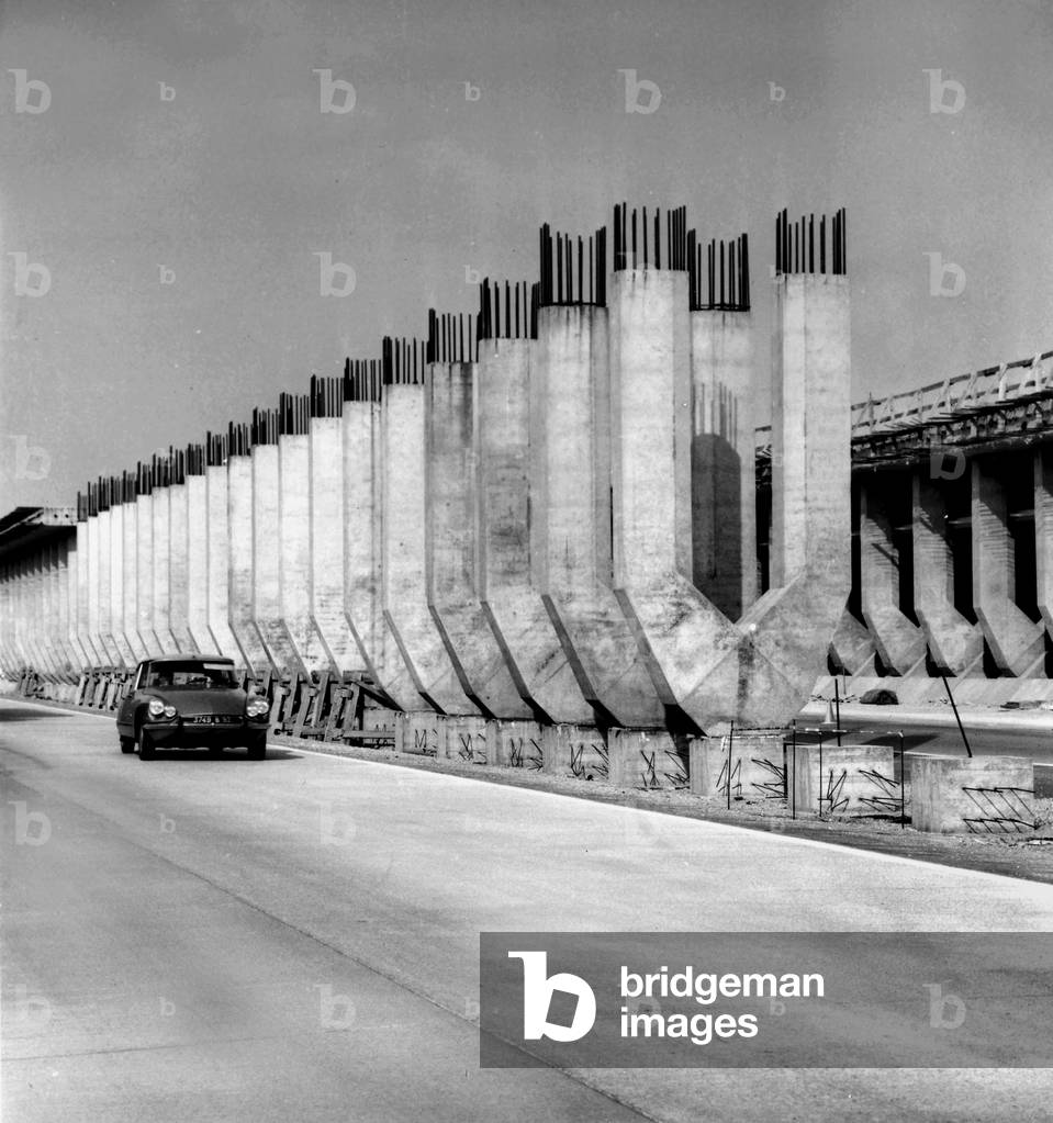 The Charles De Gaulle Airport in Roissy Near Paris : Building of Huge Pillars To Support The Northern Runway Over The Paris-Lille Motorway (b/w photo)