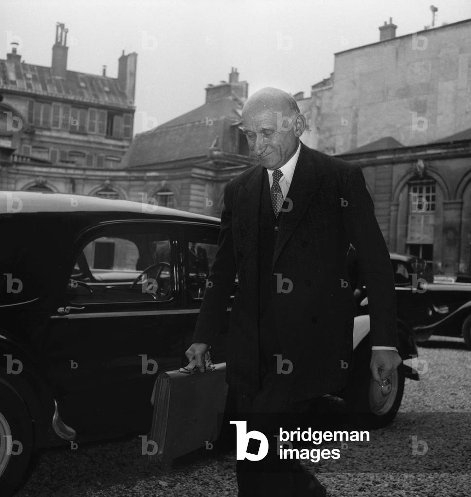 Robert Schuman arriving at Matignon Hotel, Paris, August 29, 1949 (b/w photo)