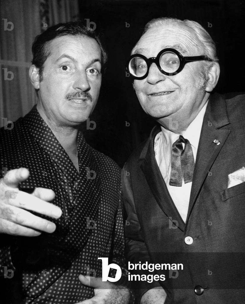 Writer Marcel Achard Congratulating Actor Michel Serrault After Premiere of Play September 8, 1968 (b/w photo)