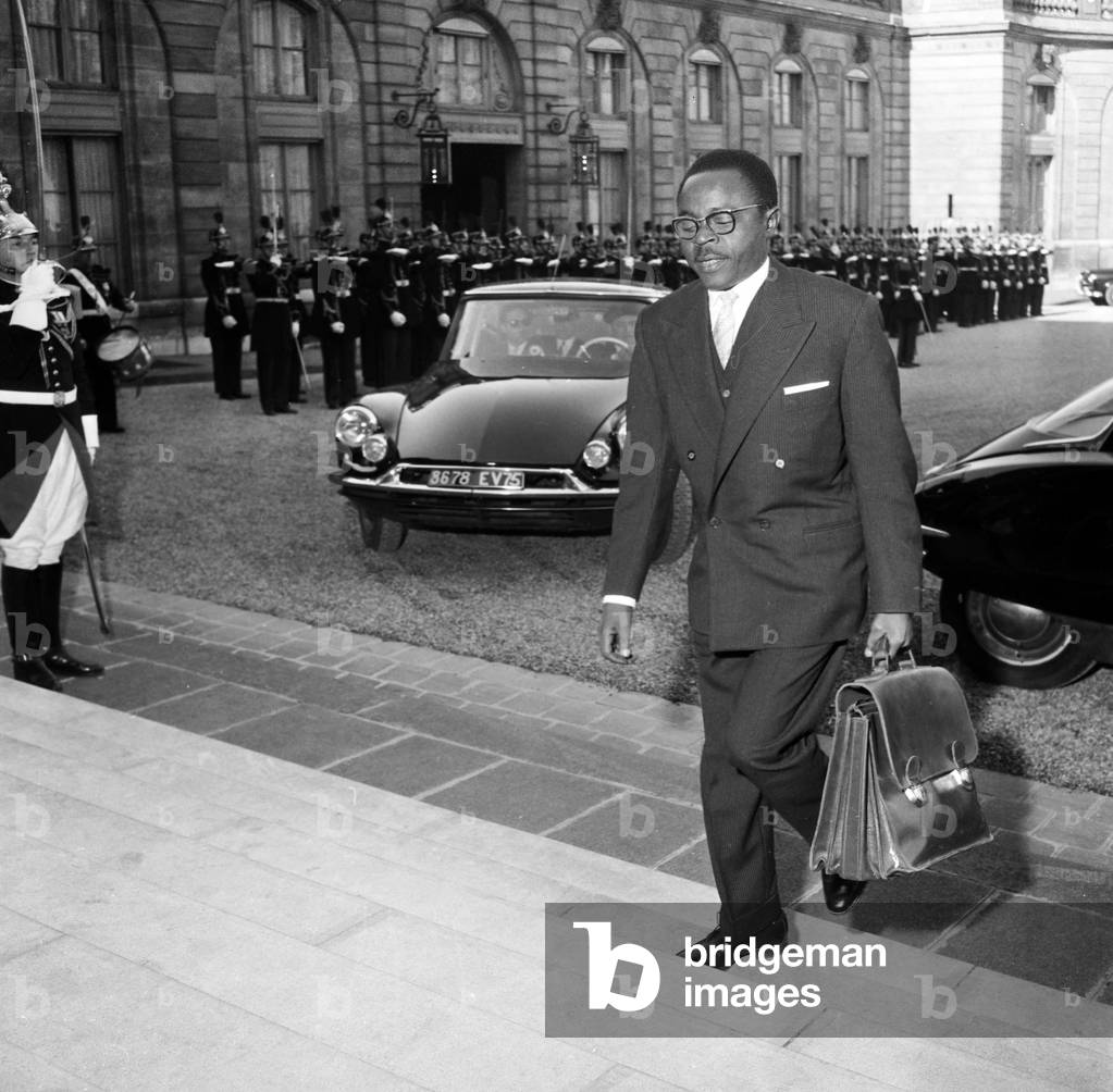 Maurice Yameogo, President of Republic of Upper Volta (Burkina Faso) Arriving at Elysee in Paris To Attend Meeting of Franco-African Community March 2, 1959 (b/w photo)