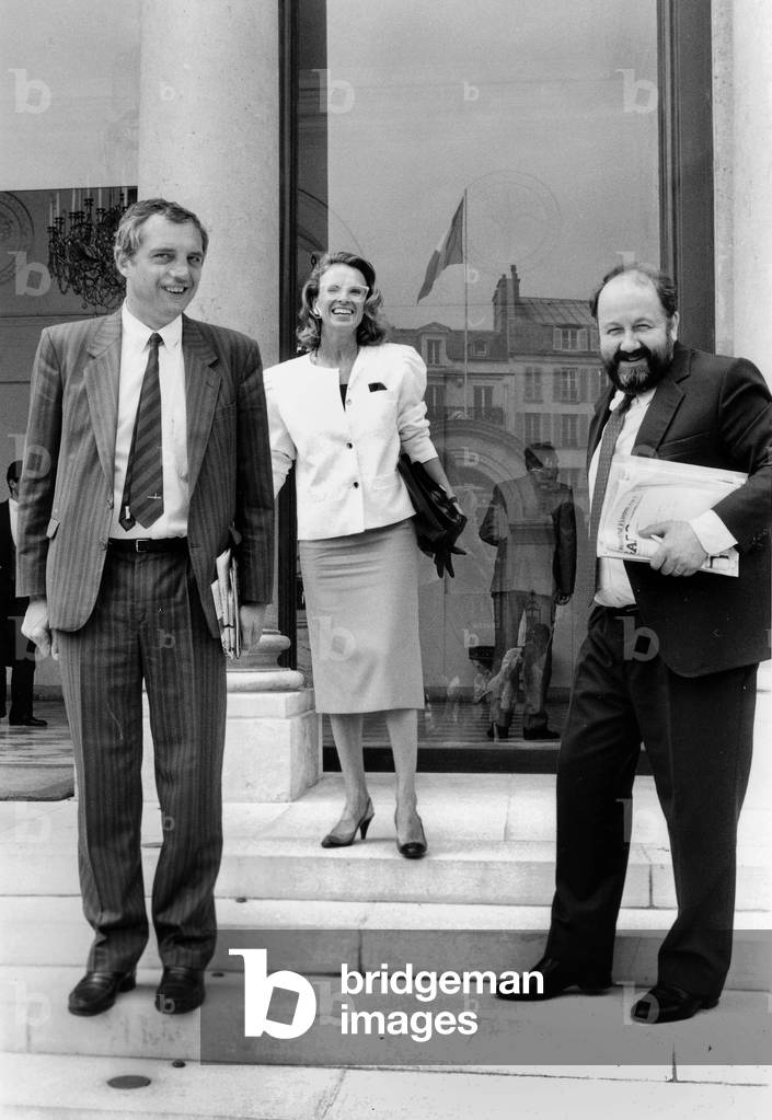 French Politicians Herve De Charette Delegate To Prime Minister (L) Michele Alliot-Marie Estate Secretary in Charge of Education and Andre Rossinot Minister in Charge With The Relationships With The Parliament (R) Leaving Elysee Palace After Ministers Council July 23, 1986 (b/w photo)