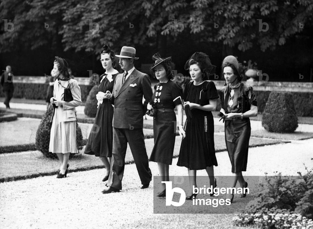 King Zogu 1St of Albania in August 1939 in Versailles, France : Left To The King Is his Wife Queen Geraldine Apponyi De Nagy Appony, Right To The King Are Is Sisters L-R Princess Maxide, Princess Myzejen, Princess Ruhije (b/w photo)