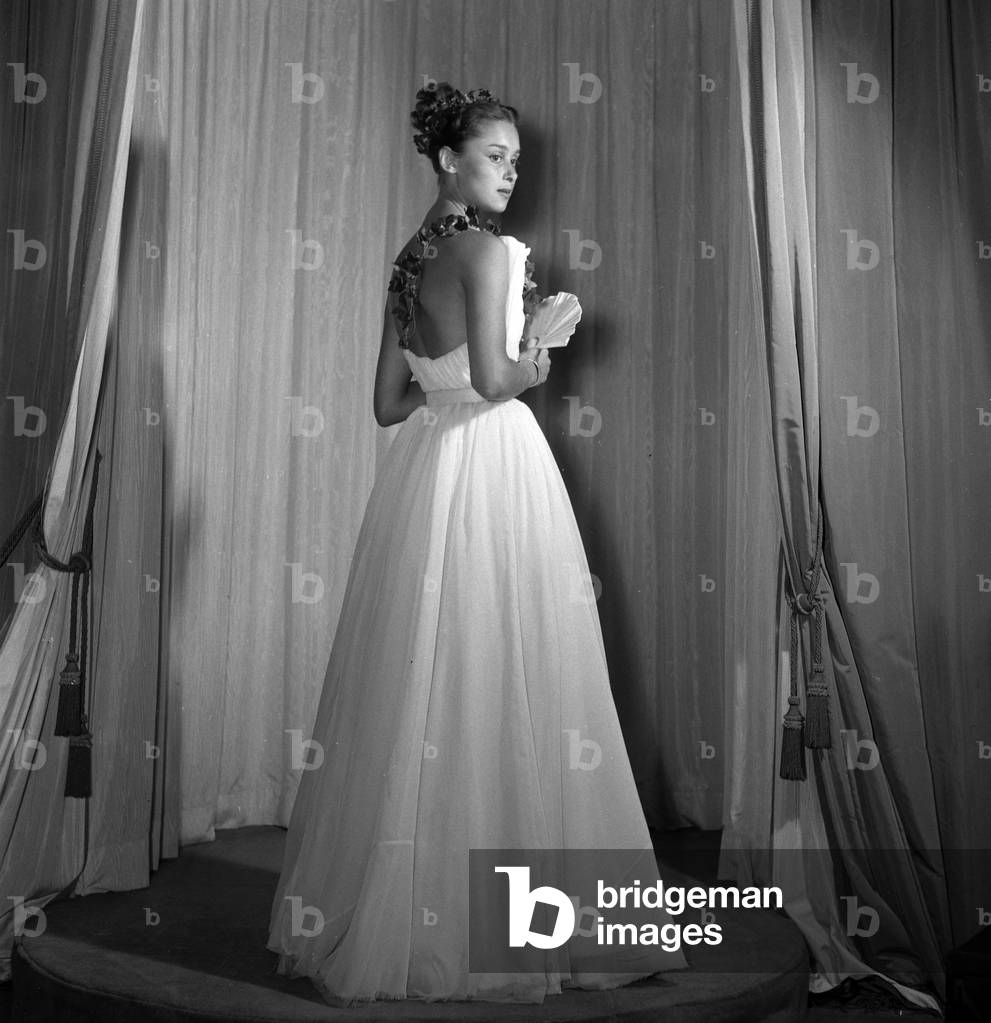 Presentation of Balmain fashion, Paris, August 1949 : evening dress (b/w photo)