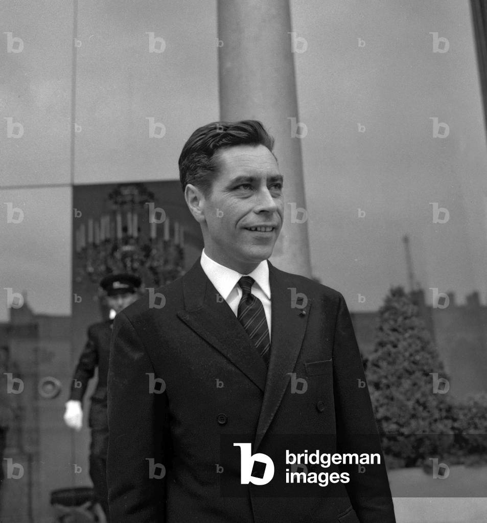 Yves Guena, French telecommunications Minister, leaving the Elysee in Paris after Council of Ministers, June 15, 1967 (b/w photo)