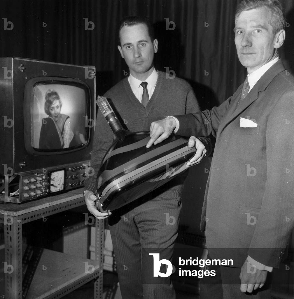 Technical Experts of The French Tv Company Presenting The New Cft Grid Tube-Image, here in Front of Tv Set Equiped With This New Device March 30, 1967 (b/w photo)