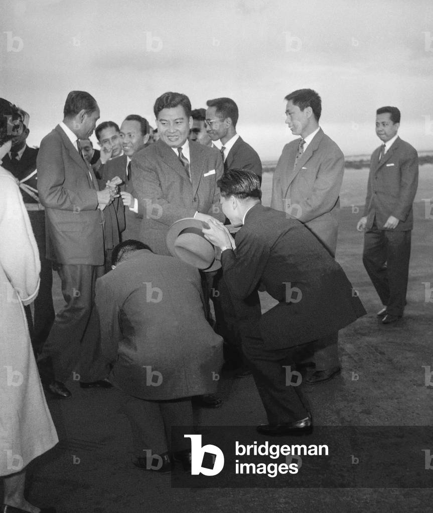 Prince Norodom Sihanouk, former Cambodian king, arriving at Nice airport, French Riviera, on April 2, 1959 (b/w photo)