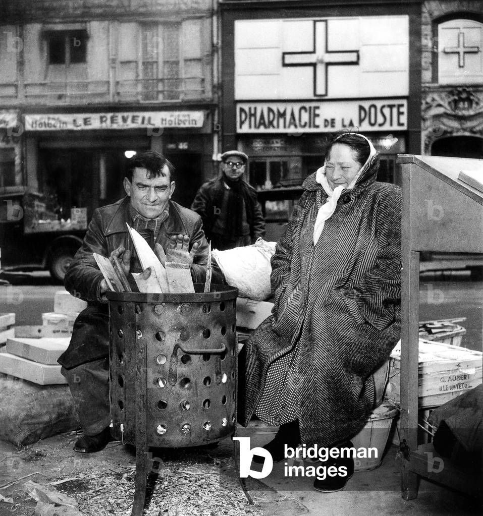 Merchants in Les Halles during The Cold Wave in France December 29, 1950 (b/w photo)