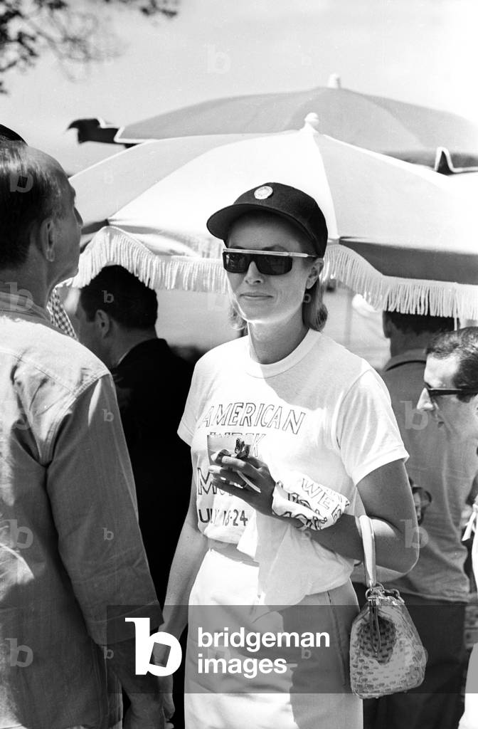 Princess Grace of Monaco (Oliver Goldsmith'S Sunglasses) during A Baseball Match in Monaco during American Week in July 1966 (b/w photo)