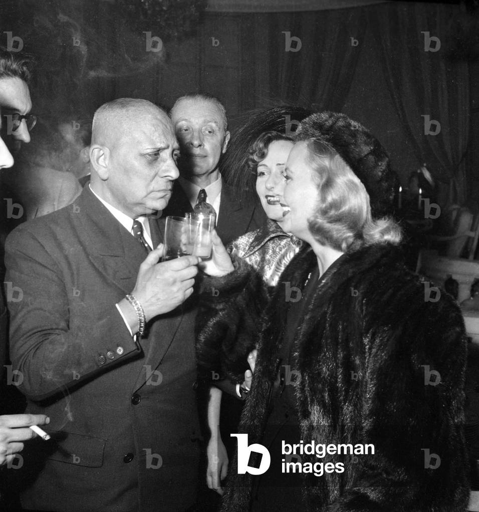 Erich Von Stroheim, Michele Morgan and Denise Vernac in Paris, January 28, 1949 (b/w photo)