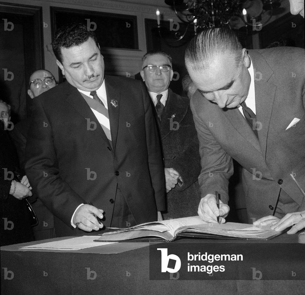 French Prime Minister Georges Pompidou in Villemomble France For The Building of The Swimming Pool here With Mayor of The Town Patrice Calmejane February 4, 1967 (b/w photo)