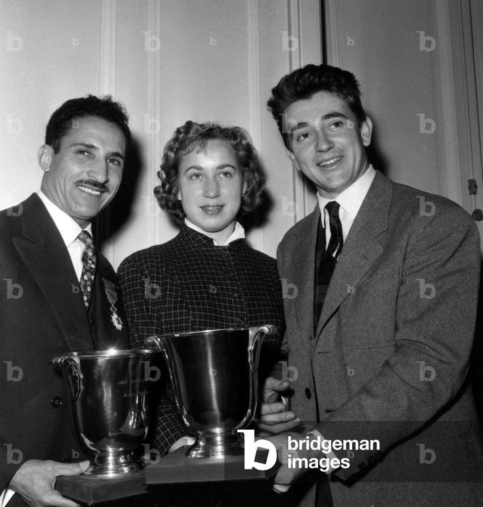 Rene Billeres Is Giving Medal and Cup To French Athlet Alain Mimoun February 2, 1957 (b/w photo)