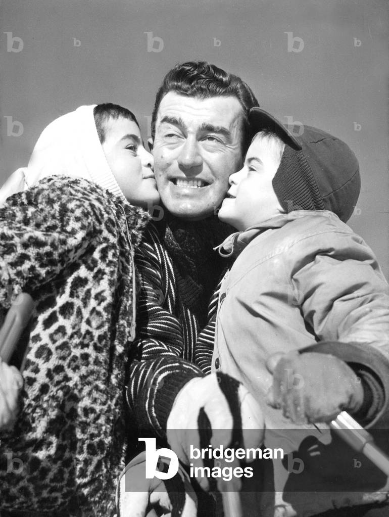 Louison Bobet With his Children Philippe (7) and Marie (9) at Les Rousses Winter Station December 28, 1957 (b/w photo)