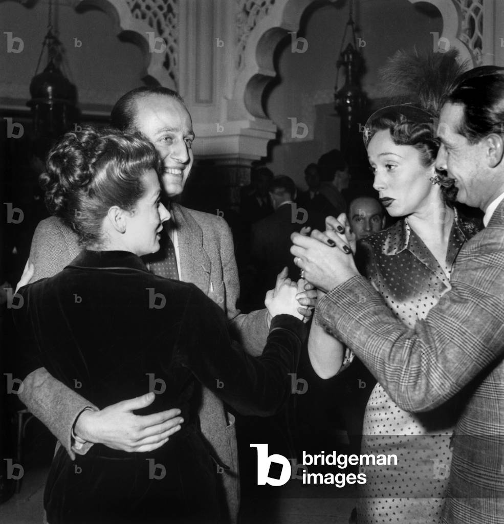 Gaby Sylvia and Mila Parely on February 14, 1949 (b/w photo)