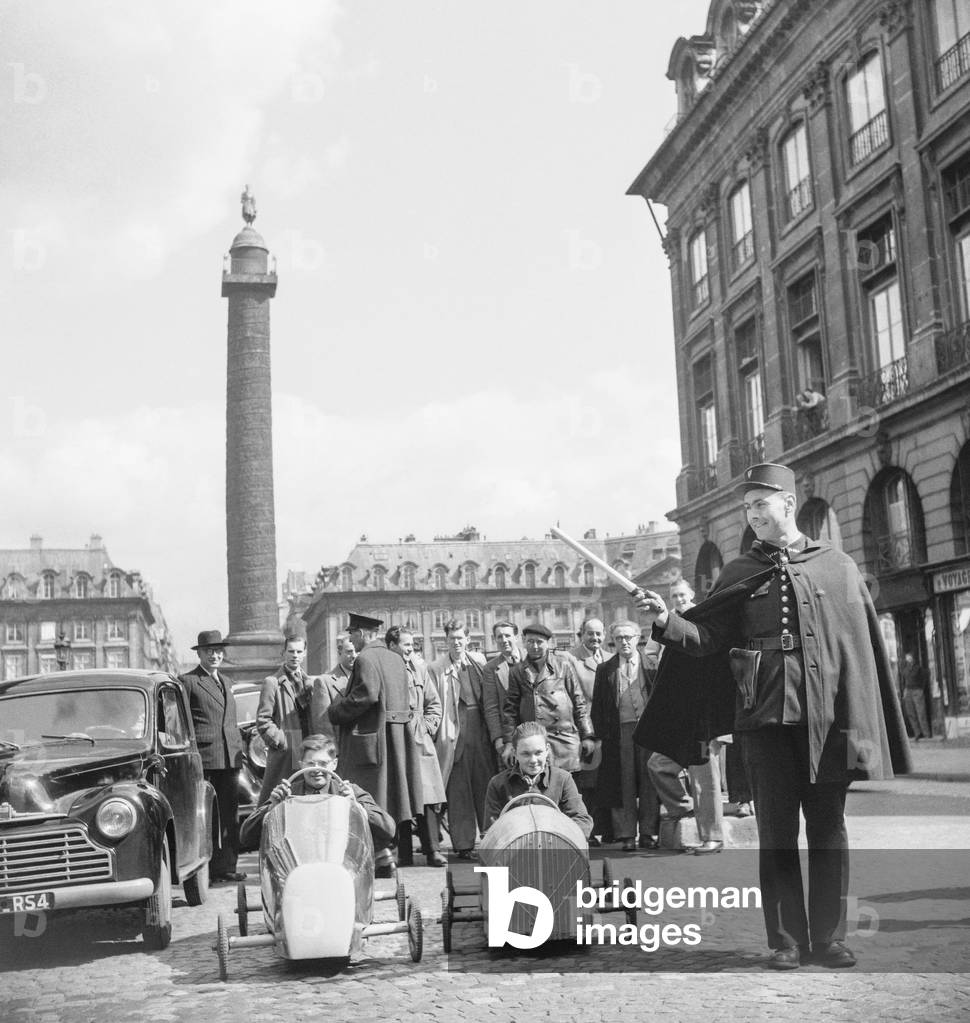 Car race for children, Place Vendome, Paris, April 13, 1950 (b/w photo)