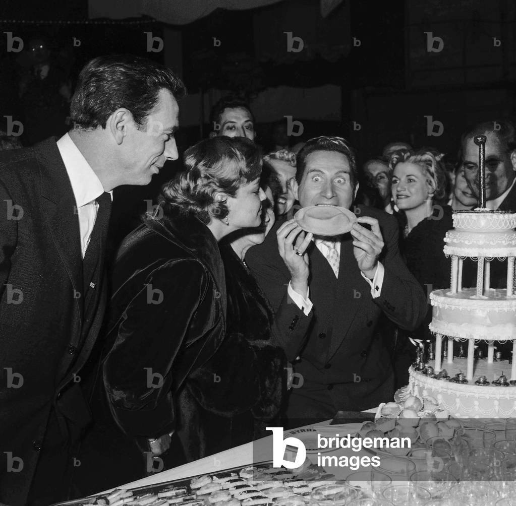 Charles Trenet celebrating his career, at the Alhambra in Paris, January 22, 1958 : Yves Montand, Simone Signoret, Charles Trenet, Philippe Clay (b/w photo)