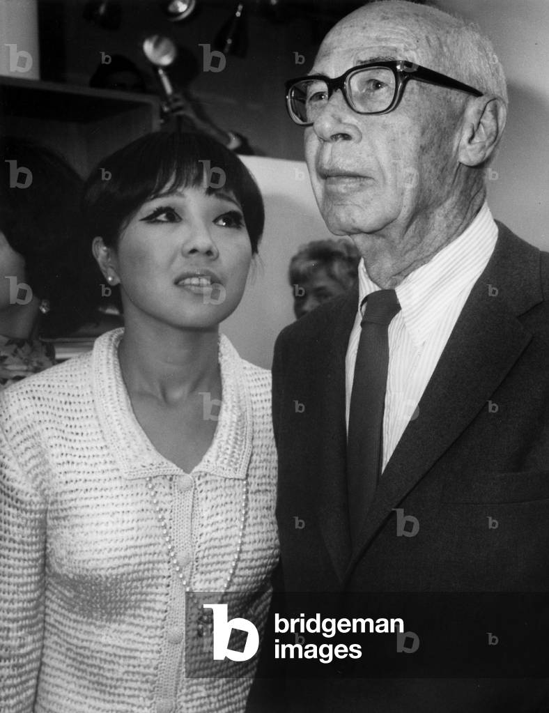 Henry Miller and his 5Th Wife Hoki Tokuda Attending Opening of Exhibition of Paintings By Miller, Galerie Gervis, Paris, September 23, 967 (b/w photo)