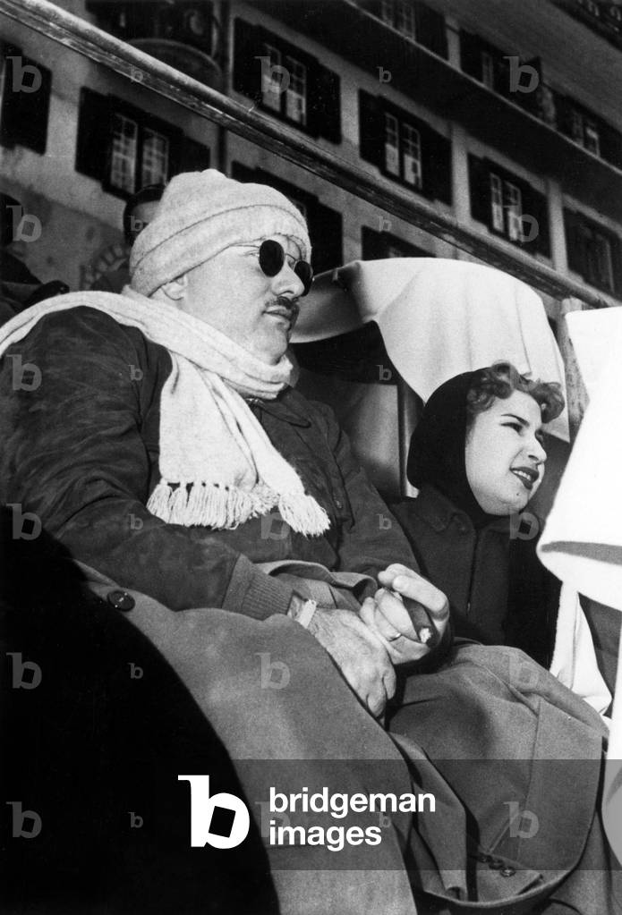 Former King Faruk 1St of Egypt and his 2Nd wife Former Queen Narriman Sadek in Saint Moritz, France January 08, 1953 (photo)