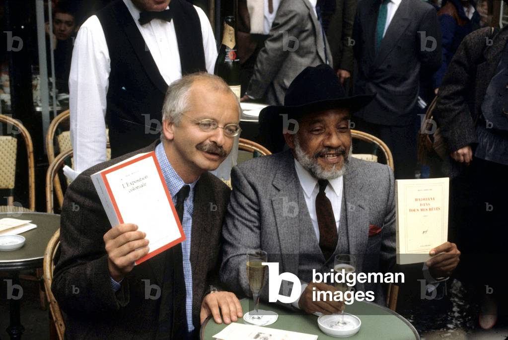 French Writers Erik Orsenna and Rene Depestre Celebrating Their Concourt Prize For Their Books L¿Exposition Coloniale and Hadriana Dans Tous Mes Reves on November 14, 1988 (photo)