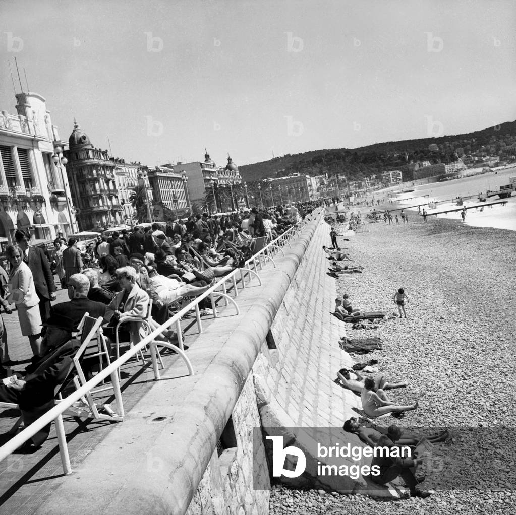 People on The Beach and on The Promenade Des Anglais Iin Nice (French Riviera) April 12, 1966 (b/w photo)