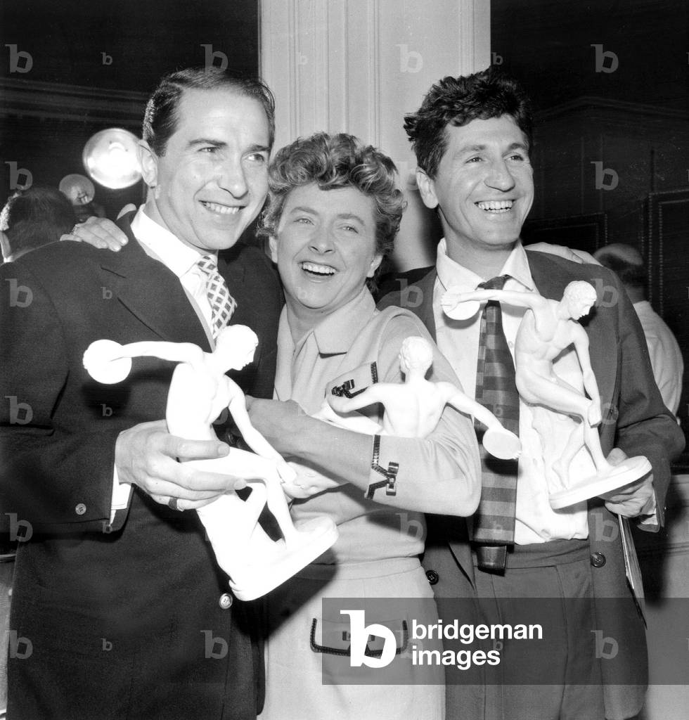 Henri Decker, Mick Michell and Marcel Mouloudji Received 