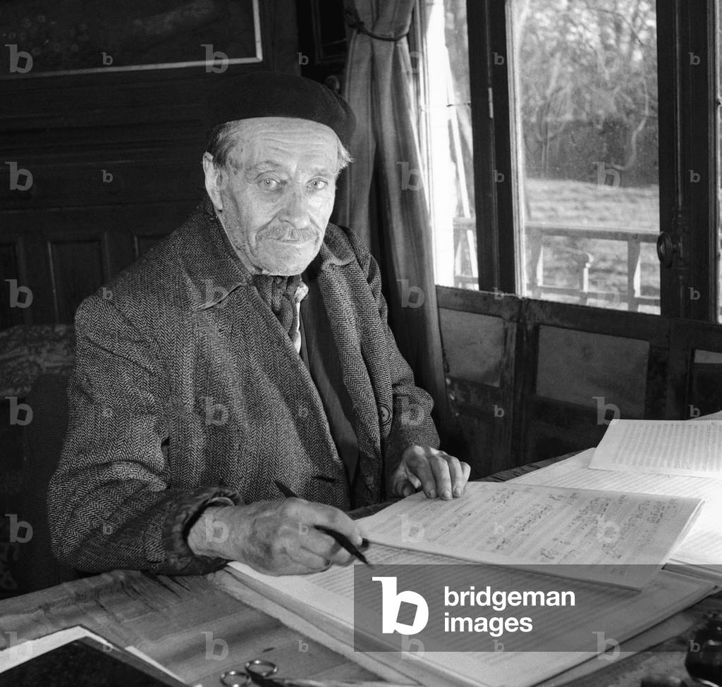 French composer Edmond Malherbe at home after he won a musical prize (