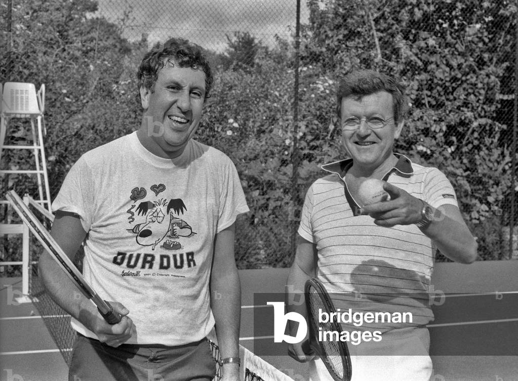 Hosts Stephane Collaro and Jose Arthur Playing Tennis during Special Week-End For Tv-Radio Hosts in Barbizon, Brittany September 28, 1981 (b/w photo)