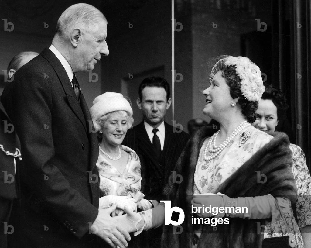 Queen Elizabeth, The Queen Mother After The Luncheon at The Elysee Palace in Paris Shaking Hands With President De Gaulle, Behind (From Left To Right) Lady Jebb, The Wife of The British Ambassador To Paris, M. Rene Broullet, The Elysee General Secretary and Mme De Gaulle April 27, 1959 (b/w photo)