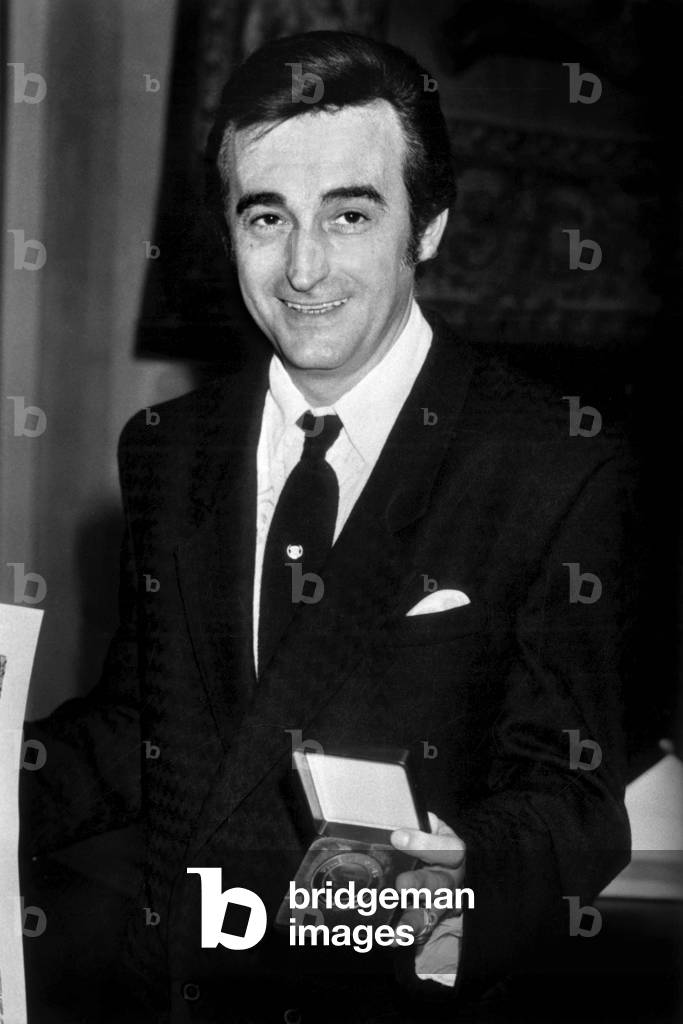 French Singer Dick Rivers, After Receiving A Medal, at Paris Town Hall, April 27, 1987 (b/w photo)