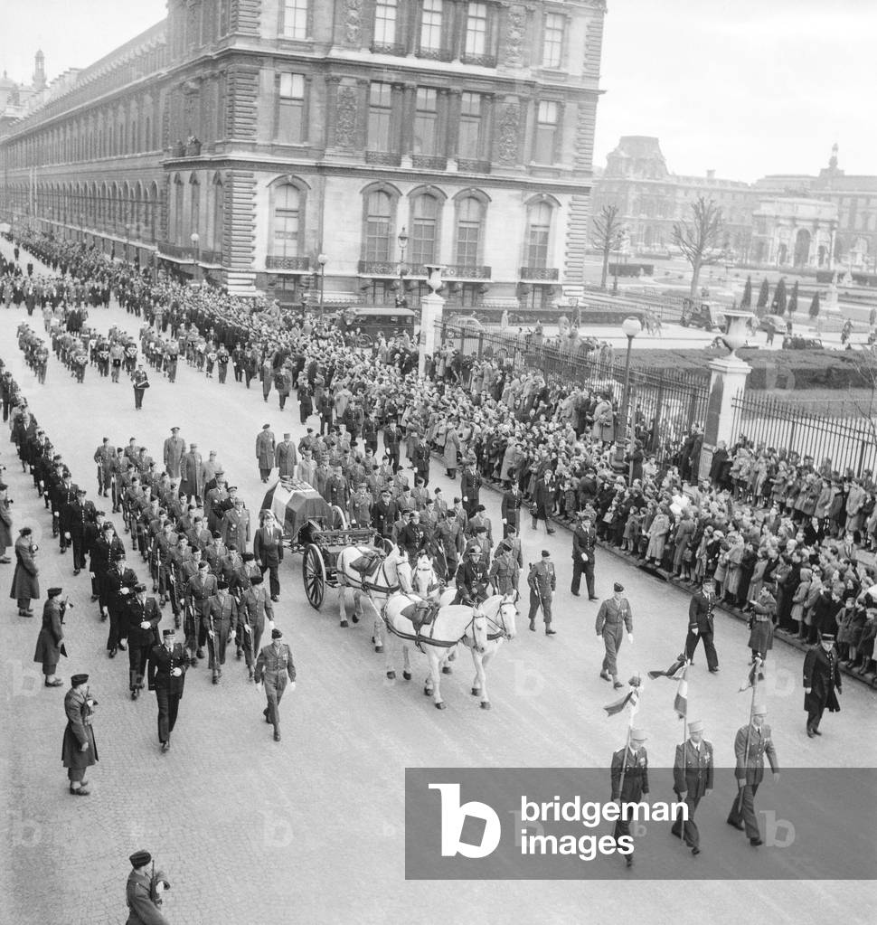 Funeral of French Marshal Jean de Lattre de Tassigny in Paris on January 15, 1952 : the procession in the rue de Rivoli (b/w photo)
